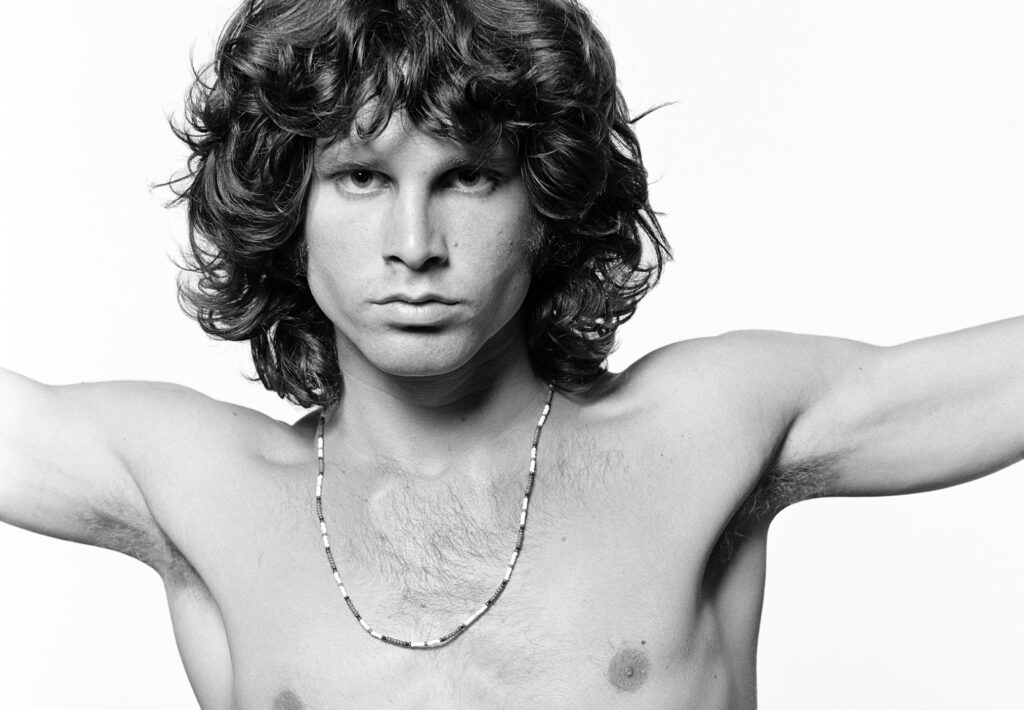 Jim Morrison performing as an example of the artistic, sensual, and unconventional Dionysian Male archetype.